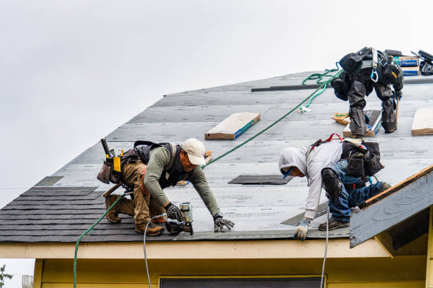 Professional Roofing technician working in Ardsley, NY